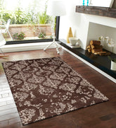Luxury wool rug featuring chocolate brown base and ivory motifs